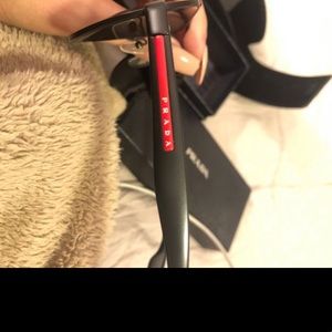 Men’s Aviator Prada Sunglasses.